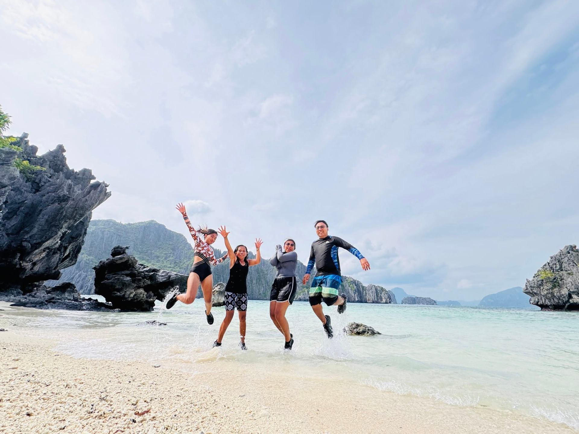 Happy guests on hidden beach